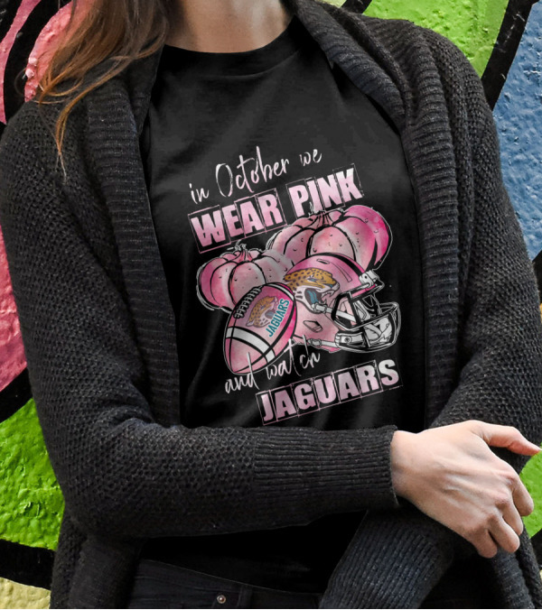 In October We Wear Pink And Watch Jaguars Football Helmet Pumpkins T-Shirt