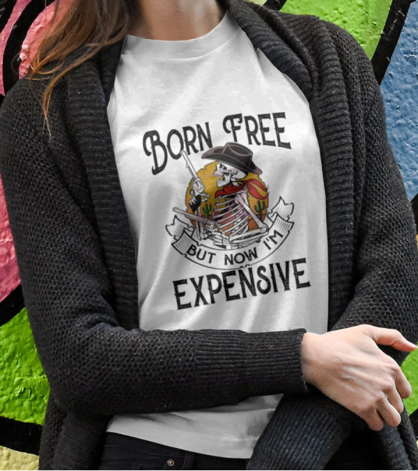 Skeleton Cowboy Born Free But Now I'm Expensive With Gun And Cactus Background T-Shirt