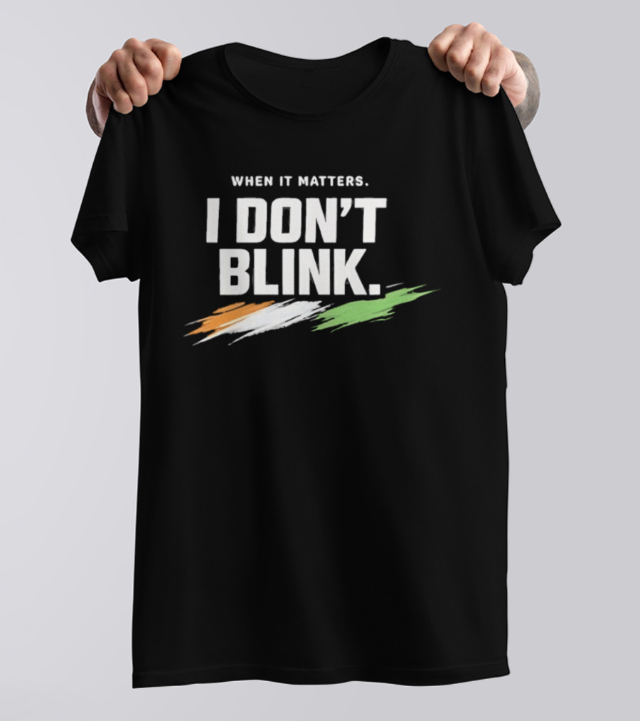 When It Matters I Don't Blink Bold Text With Orange White Green Brush Strokes T-Shirt