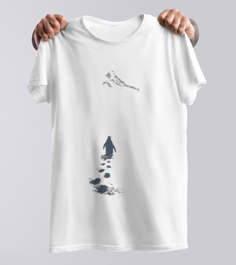 Nihilist Penguin Following Footprints Across White Snow T-Shirt