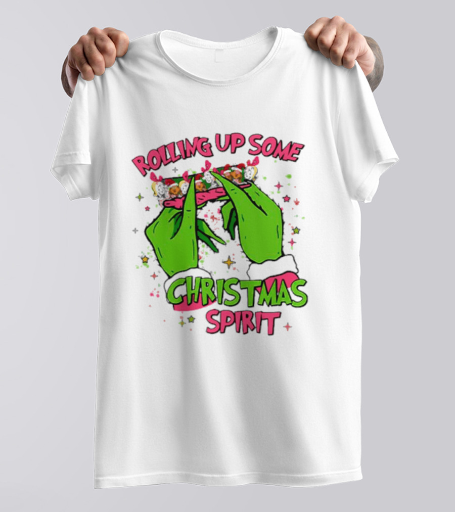 Grinch Rolling Up Some Christmas Spirit With Green Hands And Glitter Stars T-Shirt