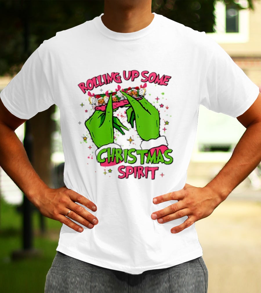 Grinch Rolling Up Some Christmas Spirit With Green Hands And Glitter Stars T-Shirt