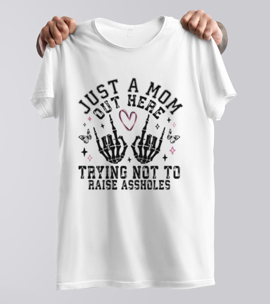 Just A Mom Out Here Trying Not To Raise Assholes Heart Skeleton Hands Butterflies T-Shirt