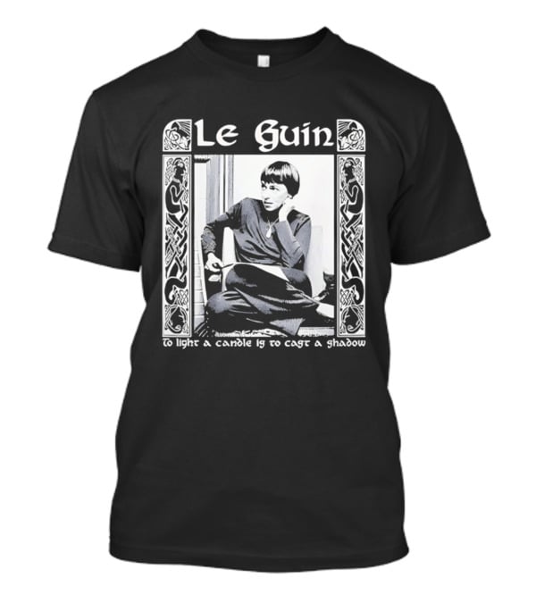 Le Guin To Light A Candle Is To Cast A Shadow T-Shirt