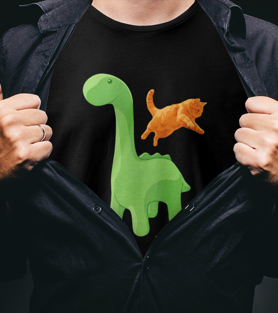 Cat Jumping Over Green Dinosaur Cartoon Image T-Shirt