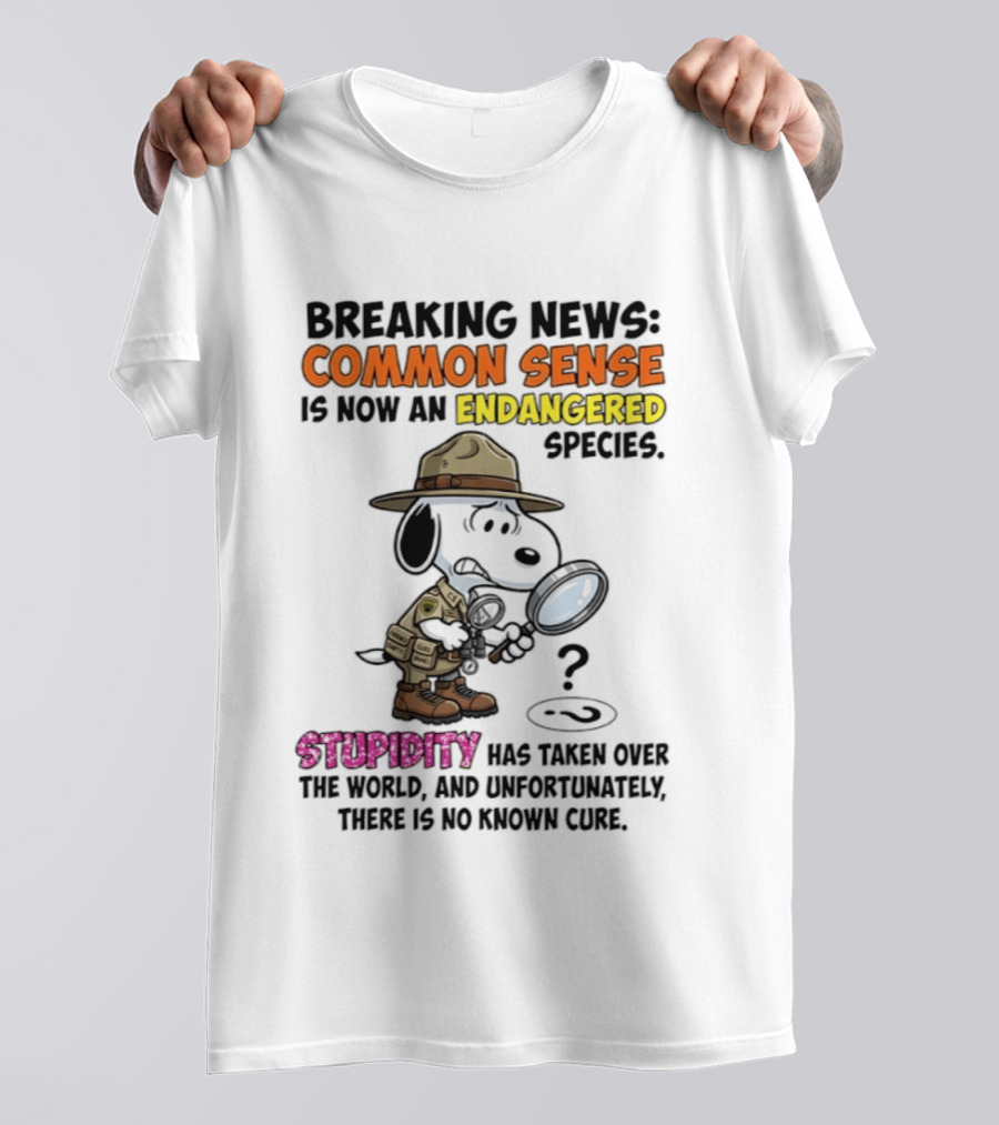 Breaking News Common Sense Endangered Species Stupidity Taken Over Snoopy T-Shirt