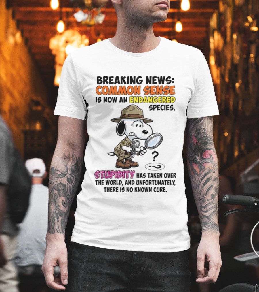 Breaking News Common Sense Endangered Species Stupidity Taken Over Snoopy T-Shirt
