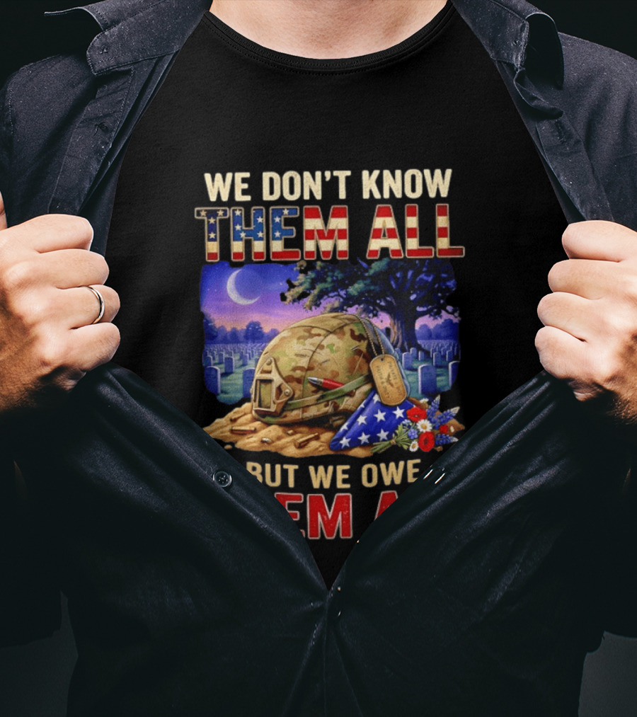We Don't Know Them All But We Owe Them All Military Memorial Helmet And Flag Gravesite Scene T-Shirt