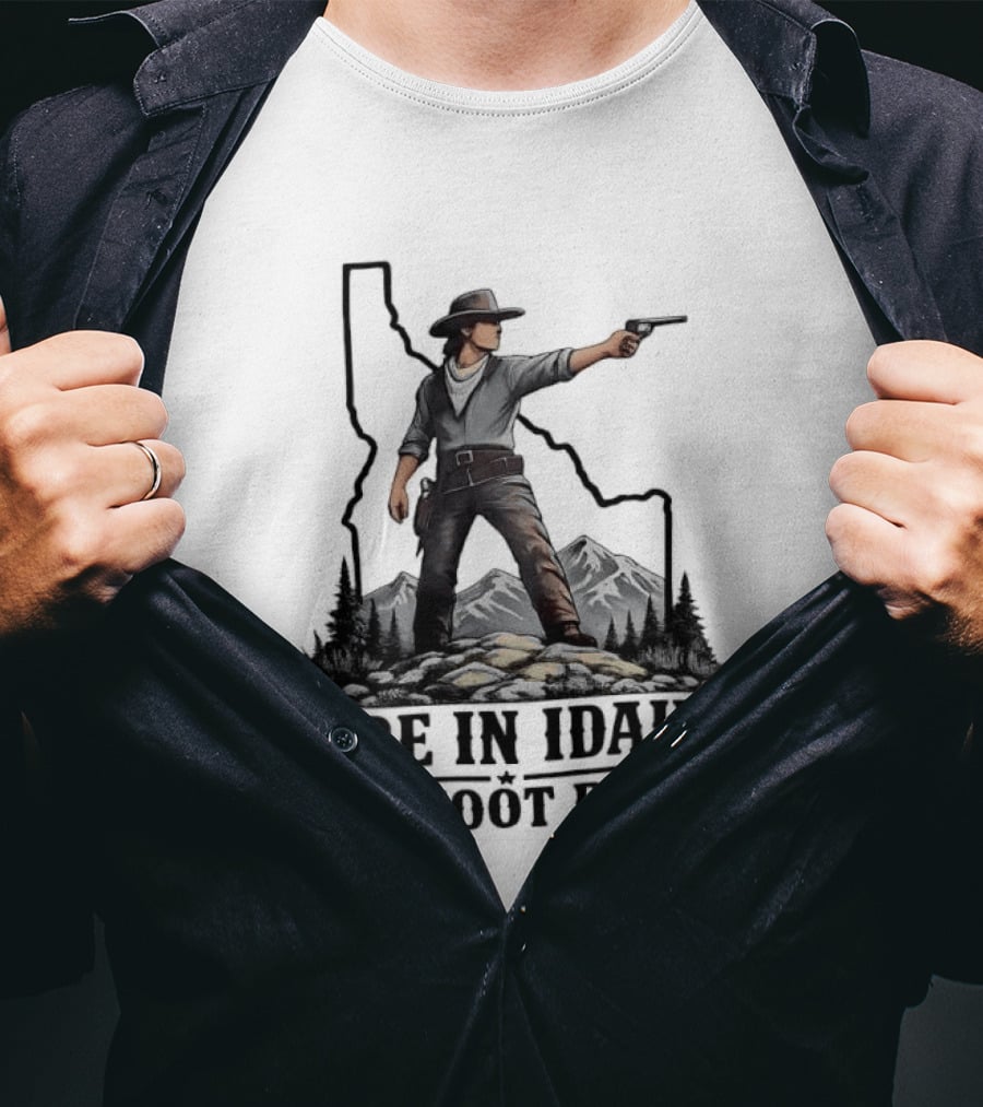 Here In Idaho We Shoot Back Cowboy With Pistol In State Mountains Scene T-Shirt