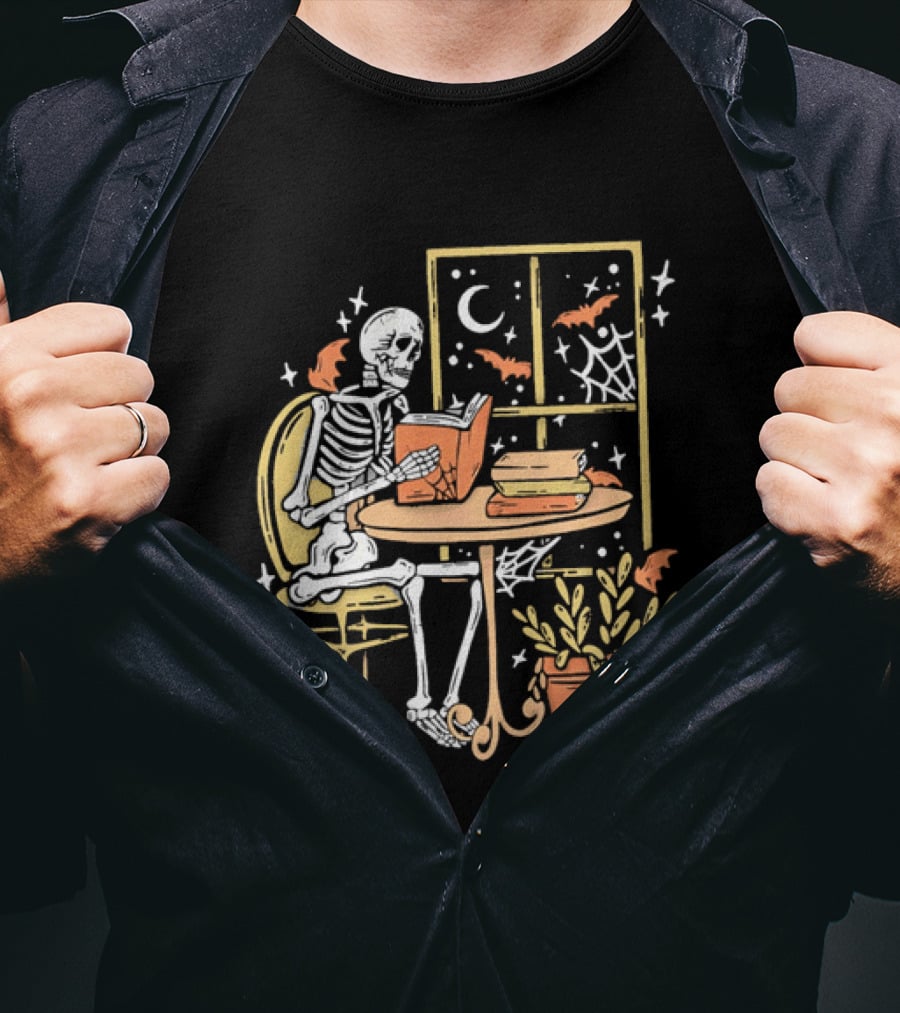 Cartoon Skeleton Reading Under Crescent Moon With Bats Orange Book Table Window T-Shirt