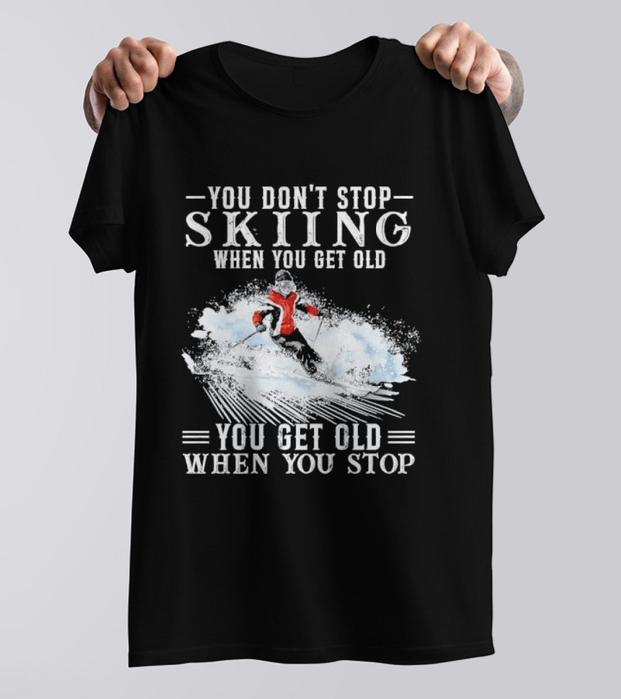 You Don't Stop Skiing When You Get Old You Get Old When You Stop Older Woman Skier Spraying Snow T-Shirt