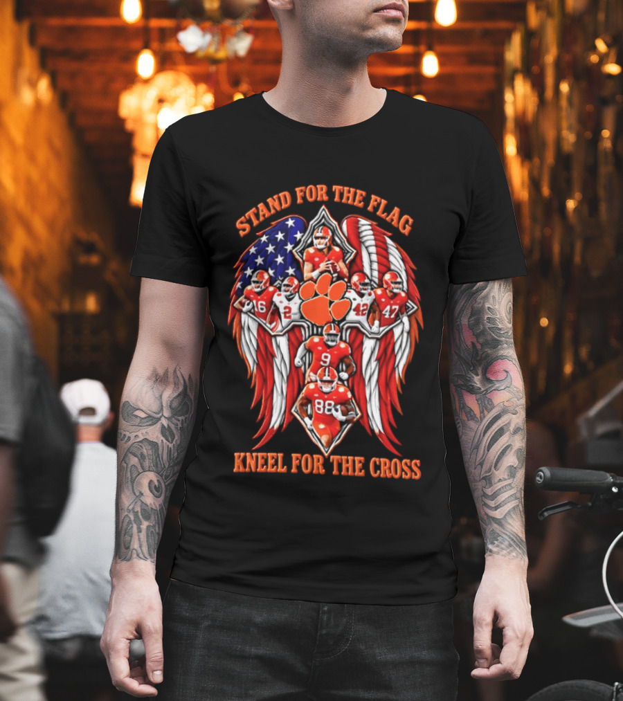 Clemson Tigers Stand For The Flag Kneel For The Cross 2026 American Flag Football Paw T-Shirt