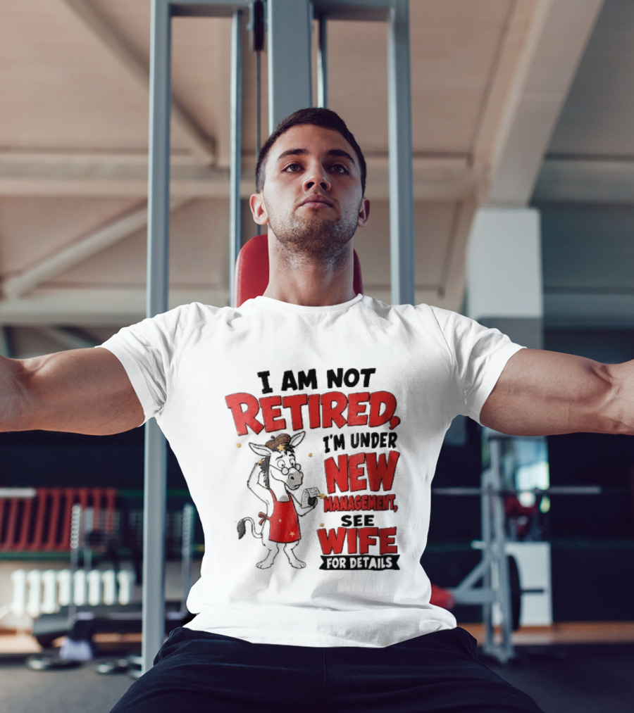 I Am Not Retired I'm Under New Management See Wife For Details Cartoon Donkey Red Apron T-Shirt