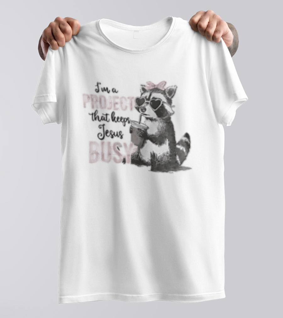 I'm A Project That Keeps Jesus Busy Raccoon Wearing Bow T-Shirt