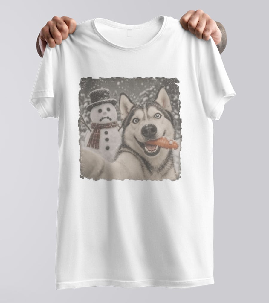 A Sled Dog With A Carrot And A Sad Snowman In A Snowy Winter Scene T-Shirt