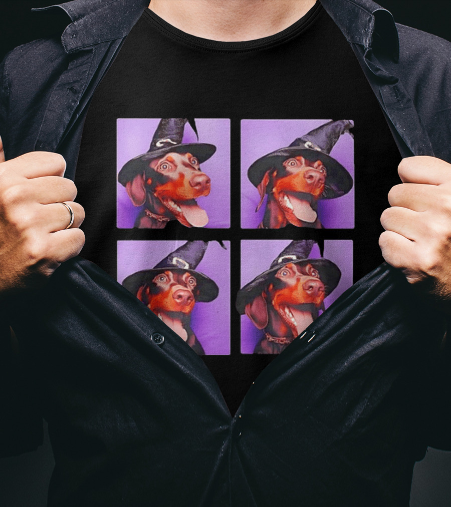 Doberman Pinscher In Witch Hat For Halloween With Purple T-Shirt