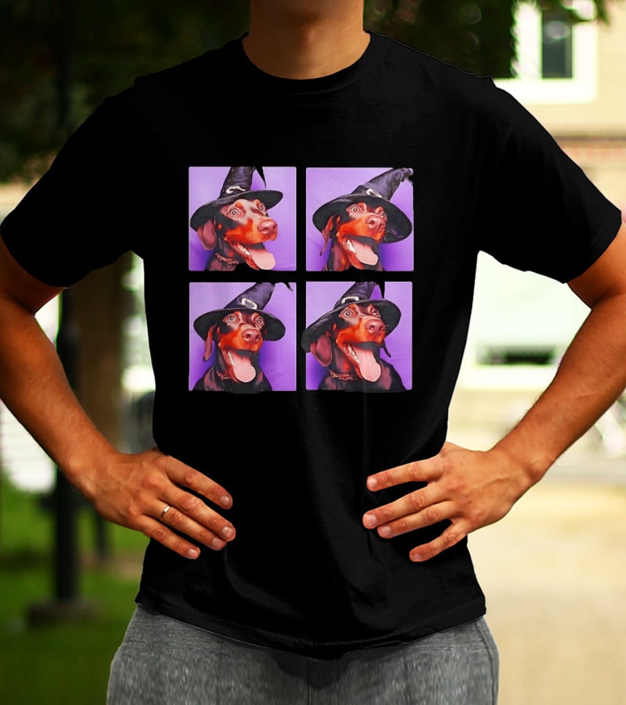 Doberman Pinscher In Witch Hat For Halloween With Purple T-Shirt