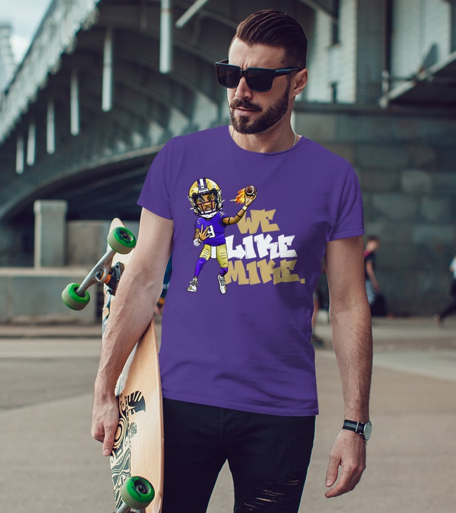 We Like Mike Football Character In Purple And Gold Gear Holding Flaming Ball T-Shirt