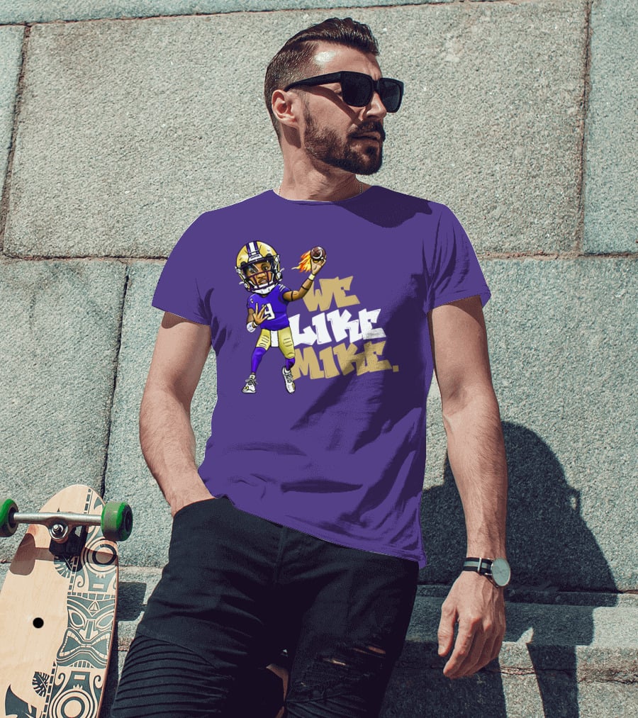 We Like Mike Football Character In Purple And Gold Gear Holding Flaming Ball T-Shirt
