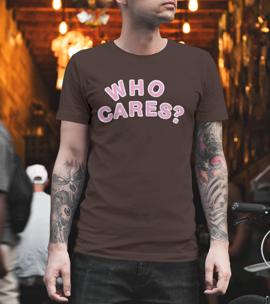 WHO CARES? Pink And White Lettering On Brown Background T-Shirt