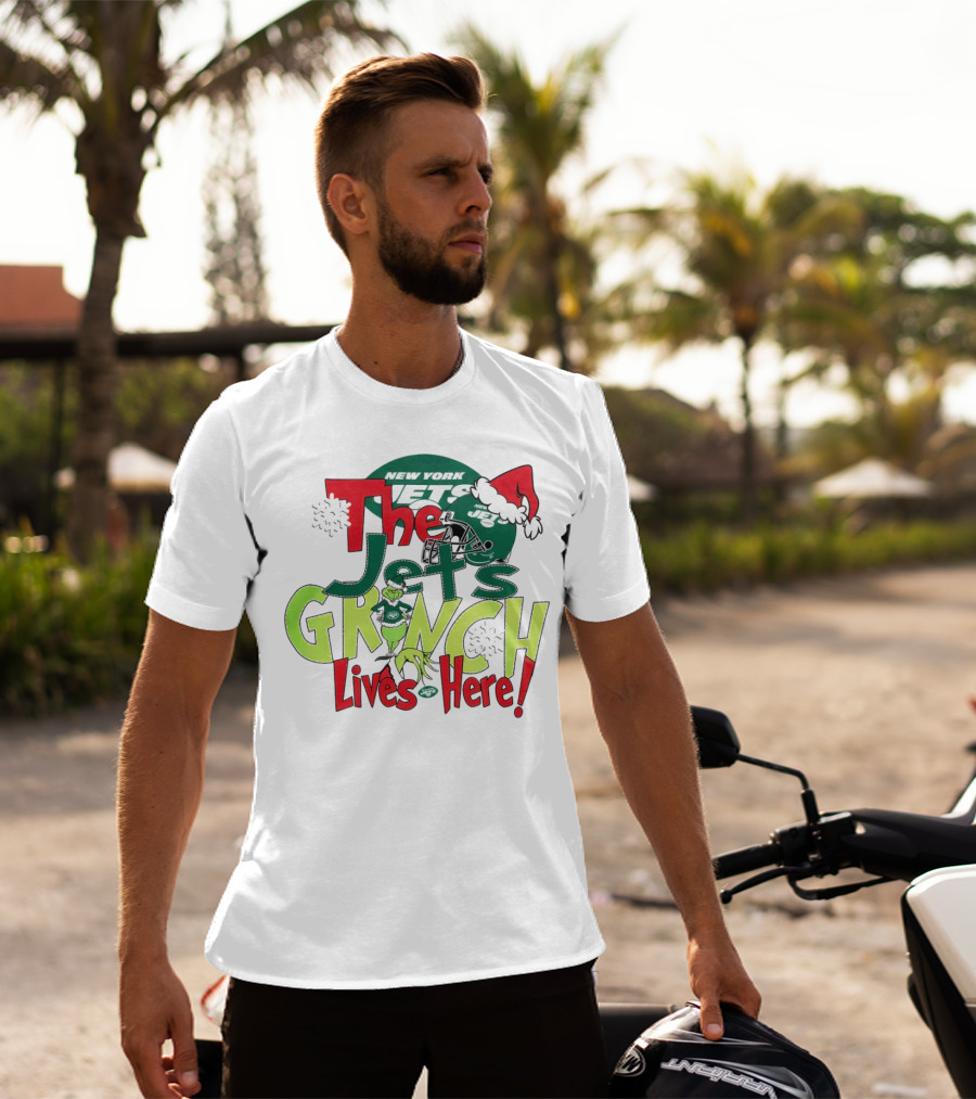 The New York Jets Grinch Lives Here Christmas Festive T-Shirt