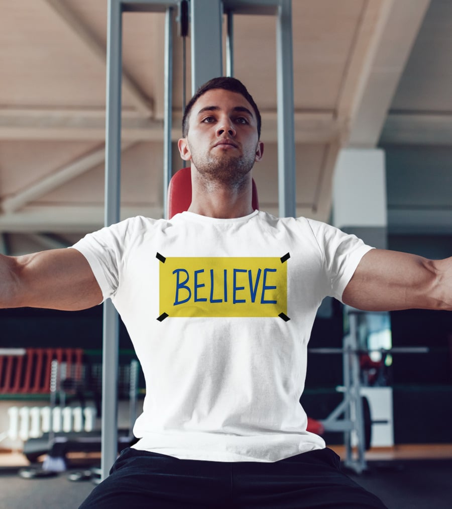 Ted Lasso Believe Sign Taped Yellow Background T-Shirt