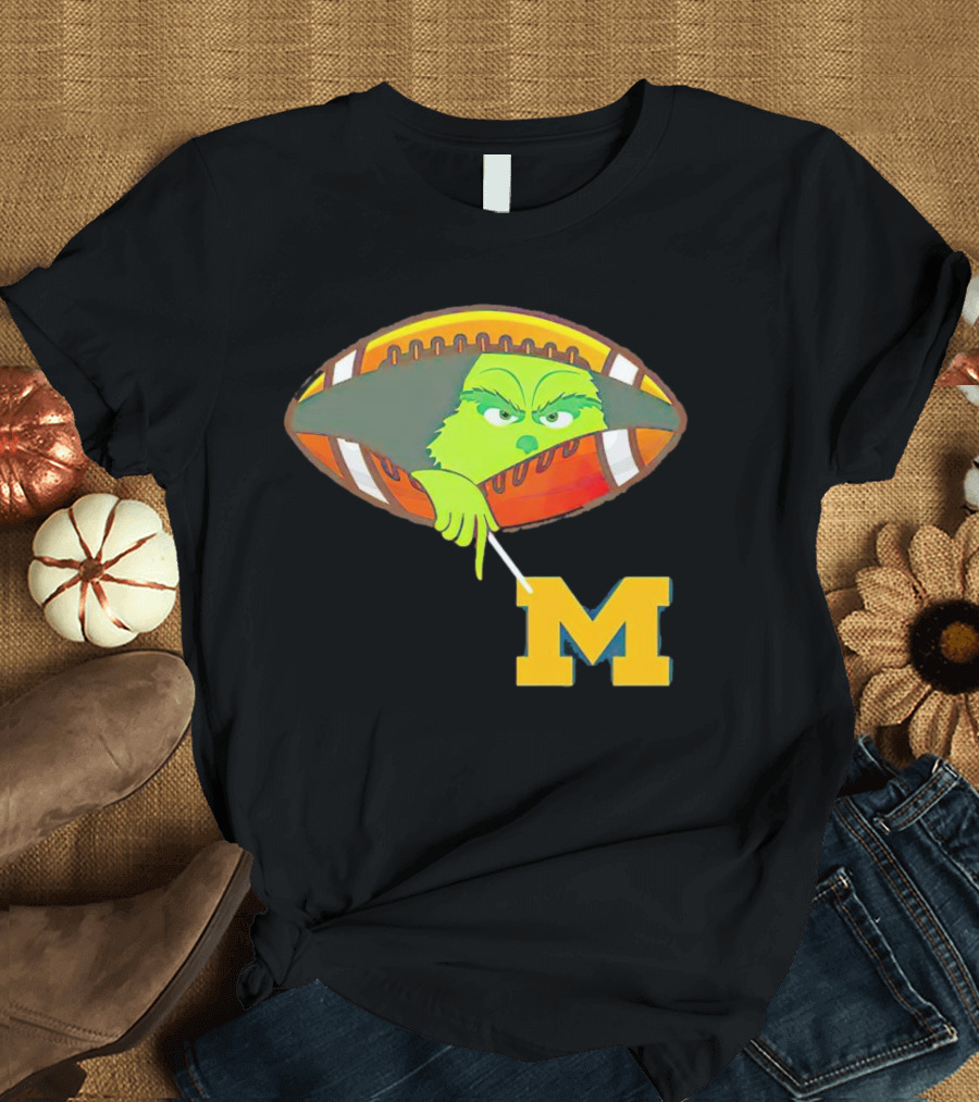 Grinch Peeking From Football Over Michigan Wolverines T-Shirt