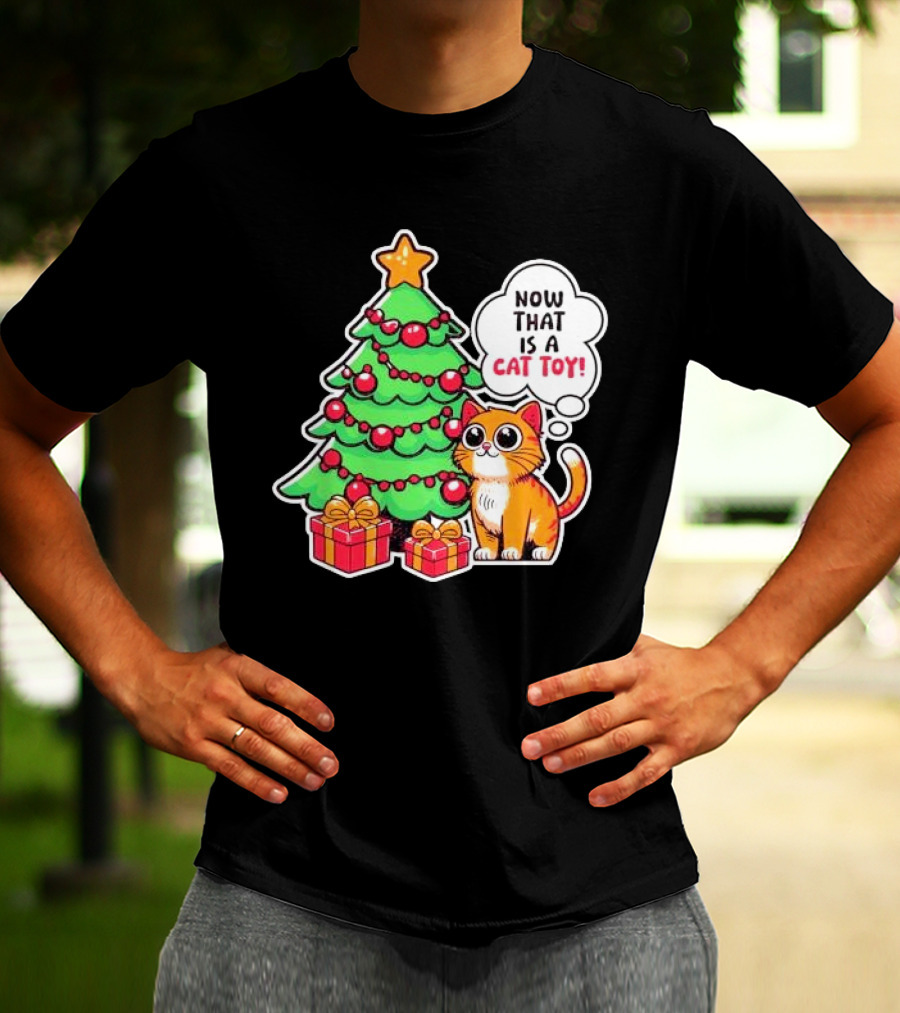 Now That Is A Cat Toy A Cute Orange Cat With Wide Eyes Next To Decorated Christmas Tree T-Shirt